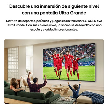 LG QNED AI QNED74 Mini LED Ultra Big TV is wall-mounted in a bright living room, showing an intense soccer moment with vivid colors and refined picture quality across a wide screen, as a family seated on sofas cheers together.